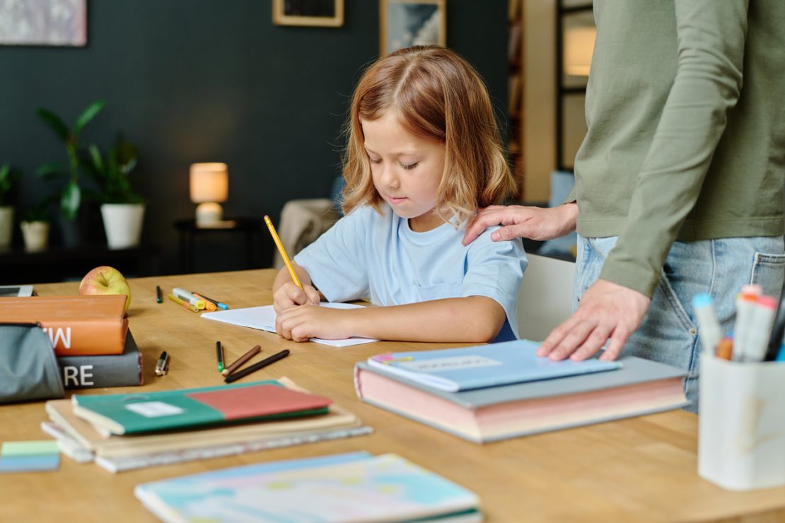 Little girl is studying